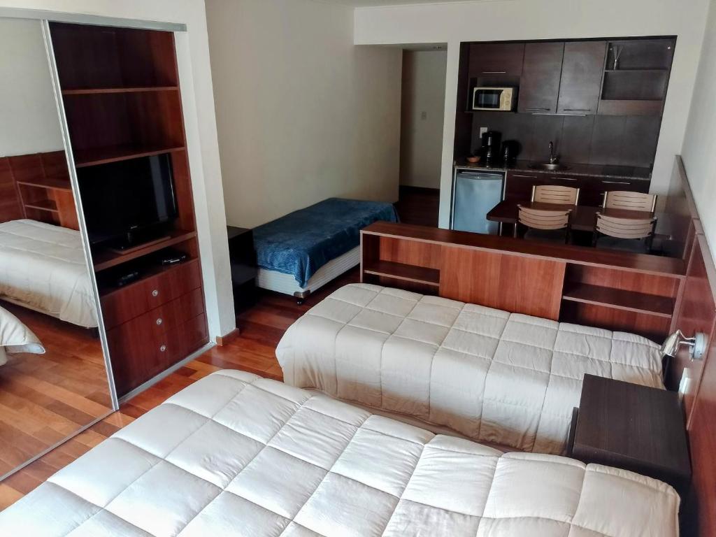 Madera Suite · Rosario centro y costanera